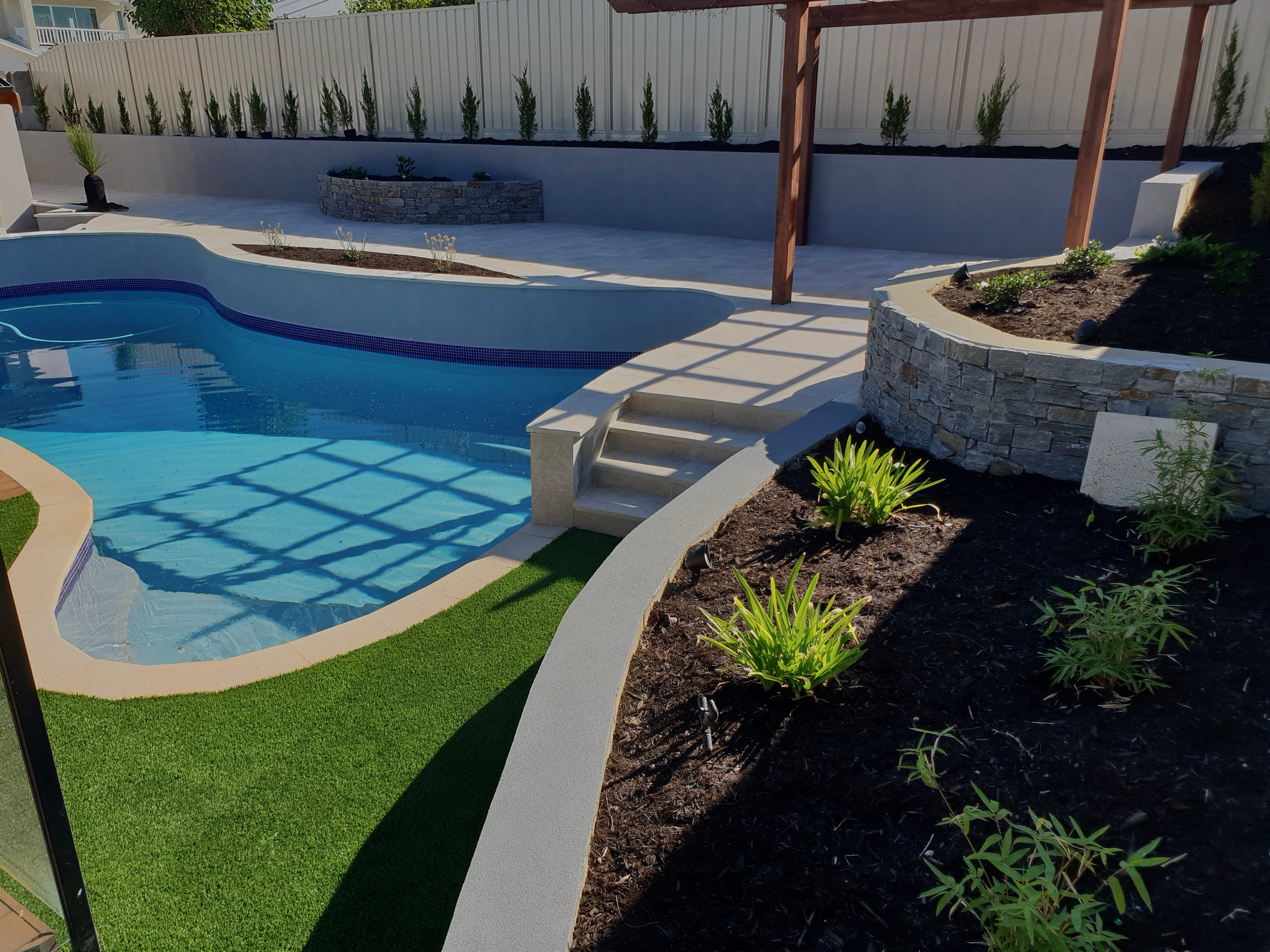 New driveway, paving and landscaped frontage after upgrade in Perth