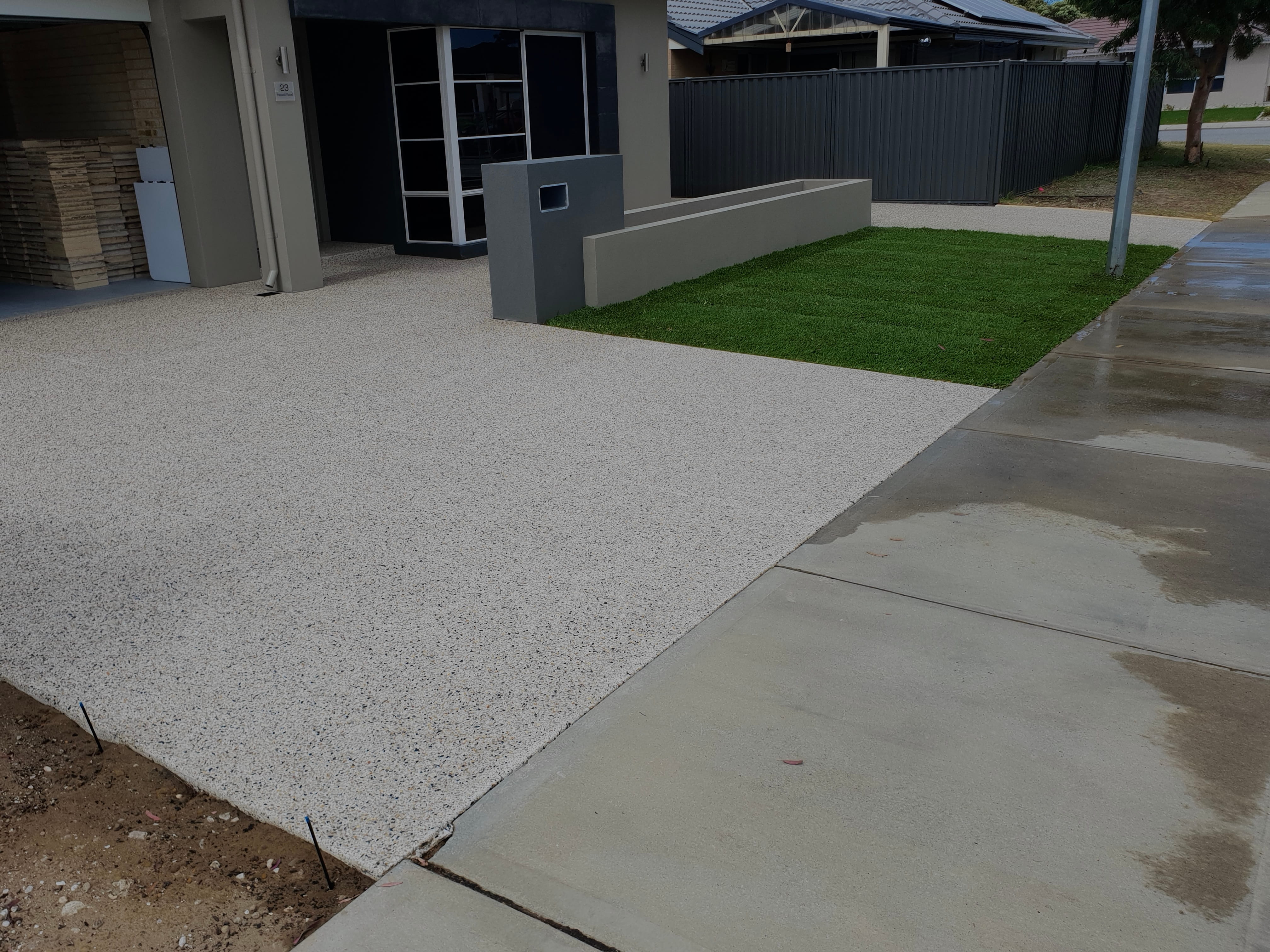 Stone driveway replacement and front yard landscaping project in Perth